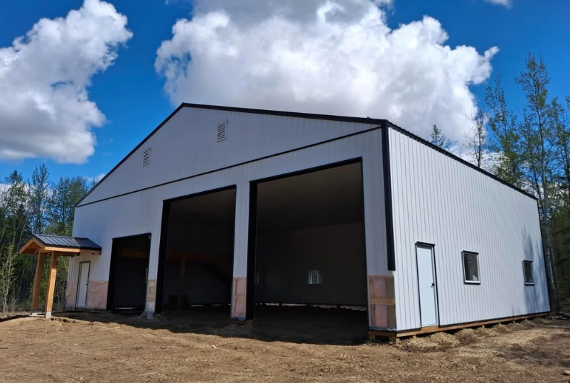 A custom post-frame shop built for practical storage, workspace and long-term use on an Alberta property.