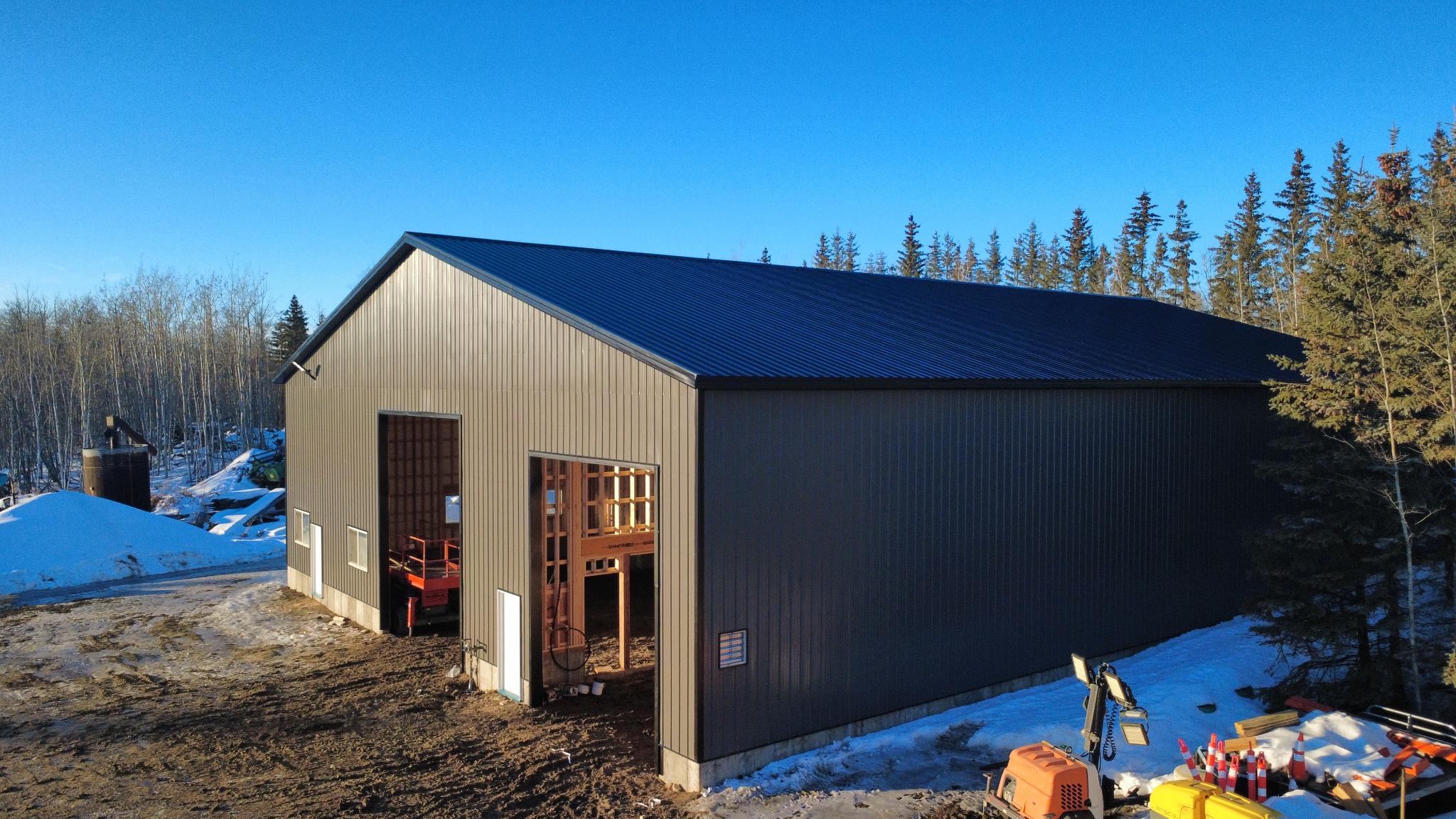 Completed post-frame shop built for an Alberta property